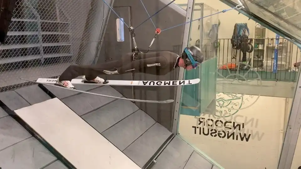 how is it possible for ski jumpers to stay in the air so long and how do they train for that